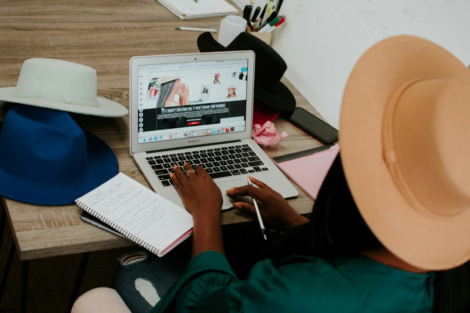 A woman in front of a laptop.